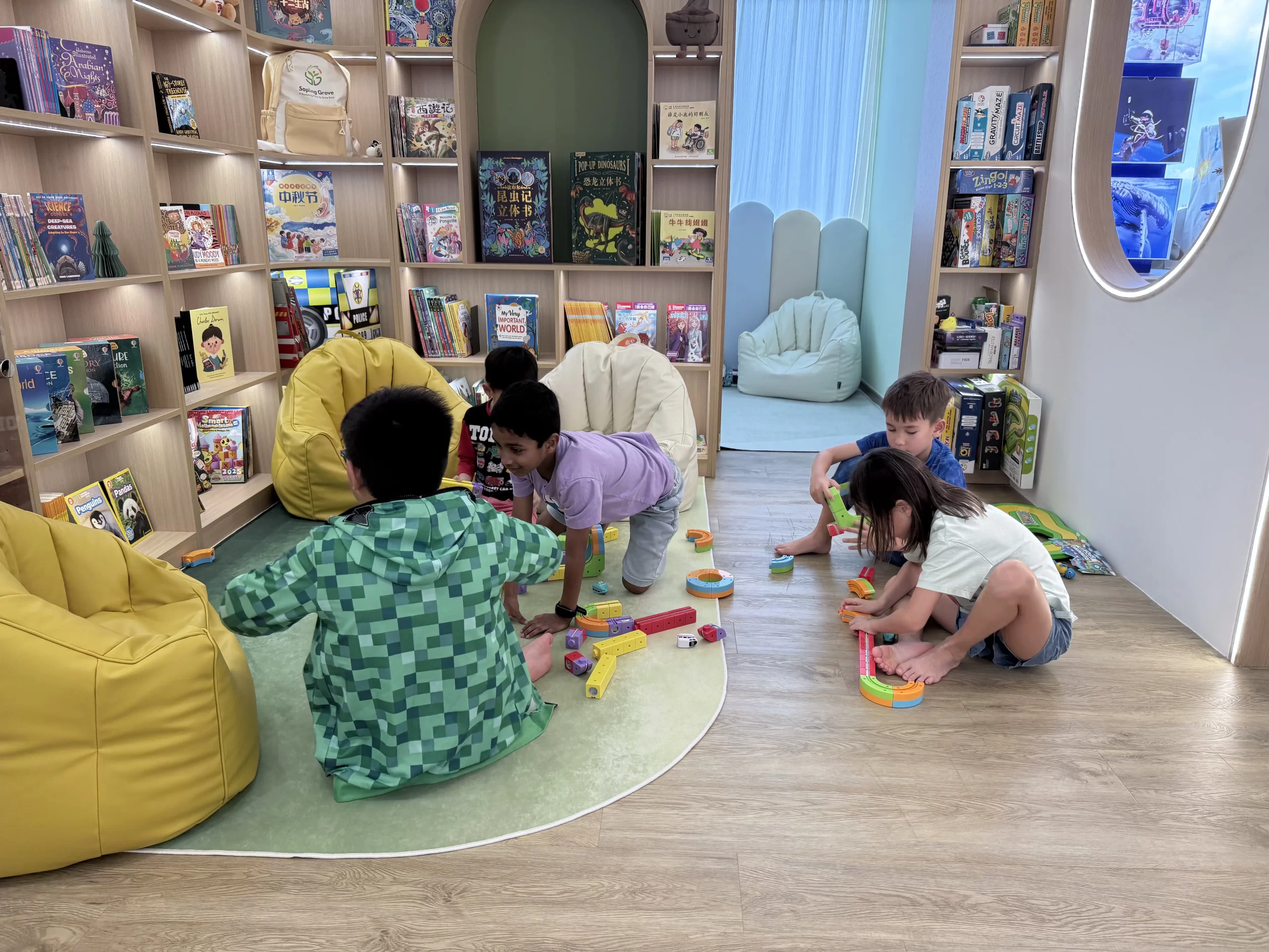 Children engaged in an activity at Sapling Grove